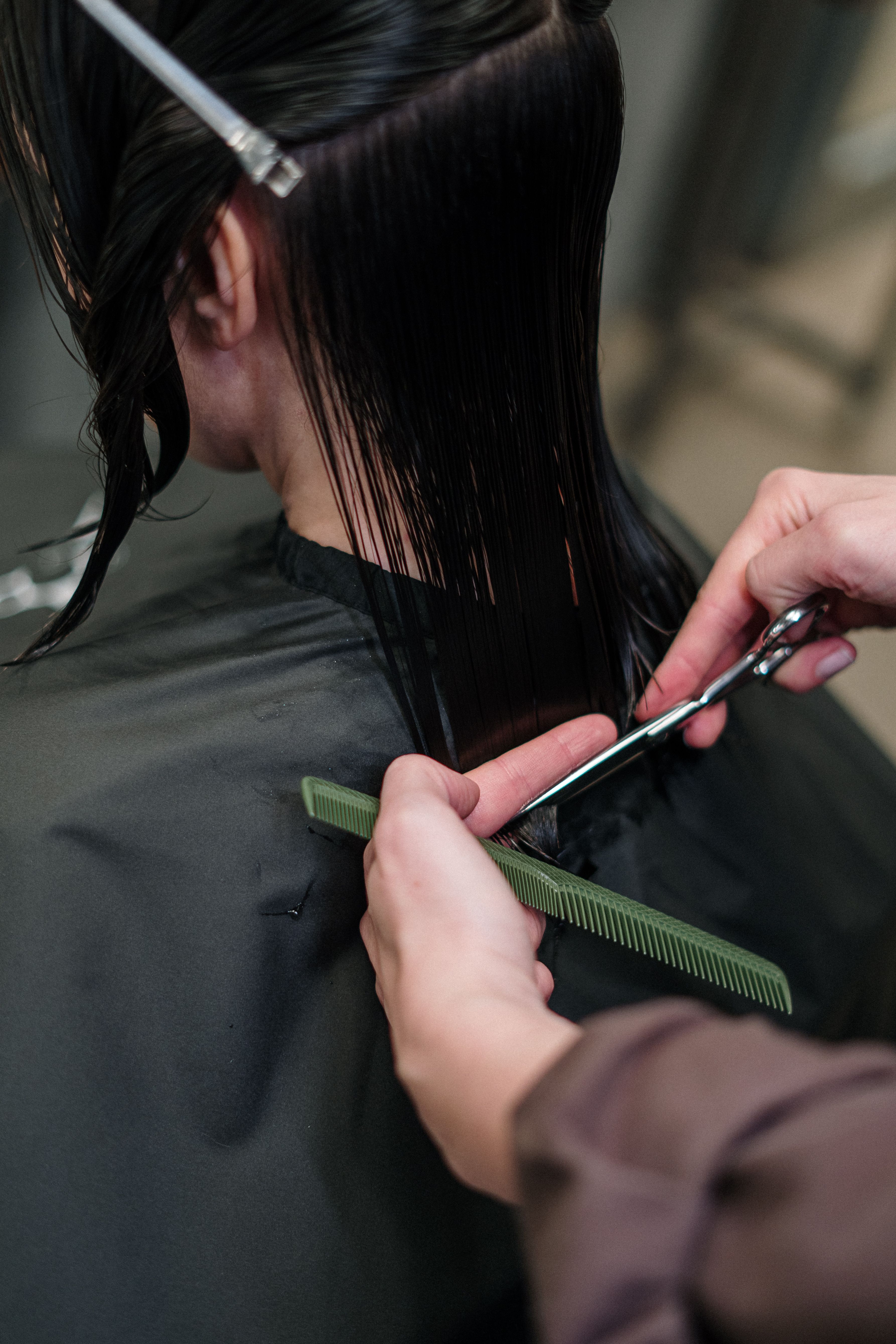Hair Day stylist creating a modern haircut